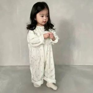 Oversized floral jumpsuit. Size XL (5-8yrs). Soft lavender flowers. Never worn.